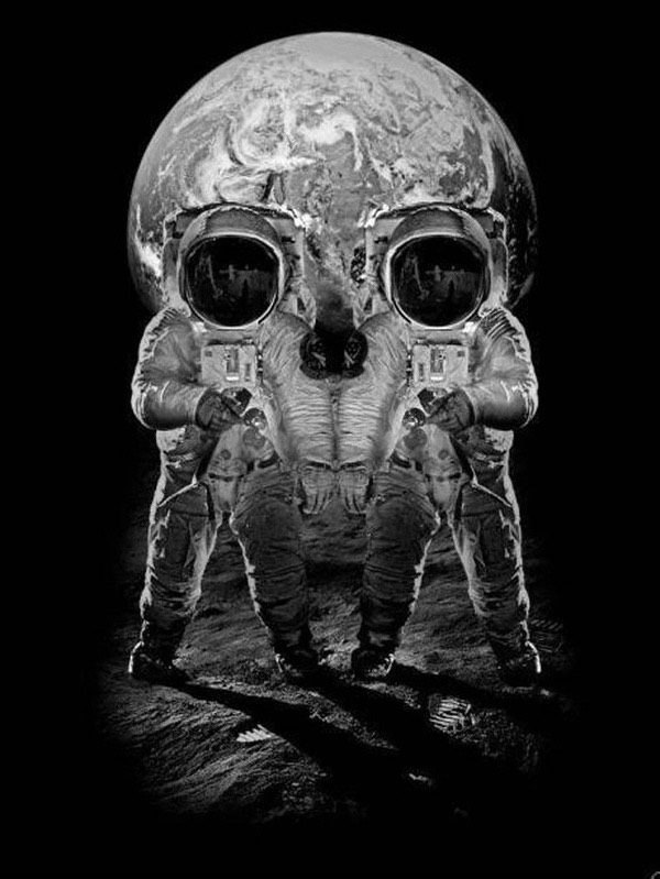 A monochrome space collage: two astronauts stand beneath a planet, together forming the illusion of a skull.